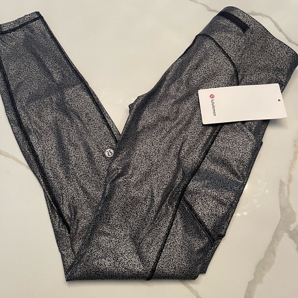 Lululemon brand new speed tight size 4.  28 inch. Side pockets. - Picture 1 of 9
